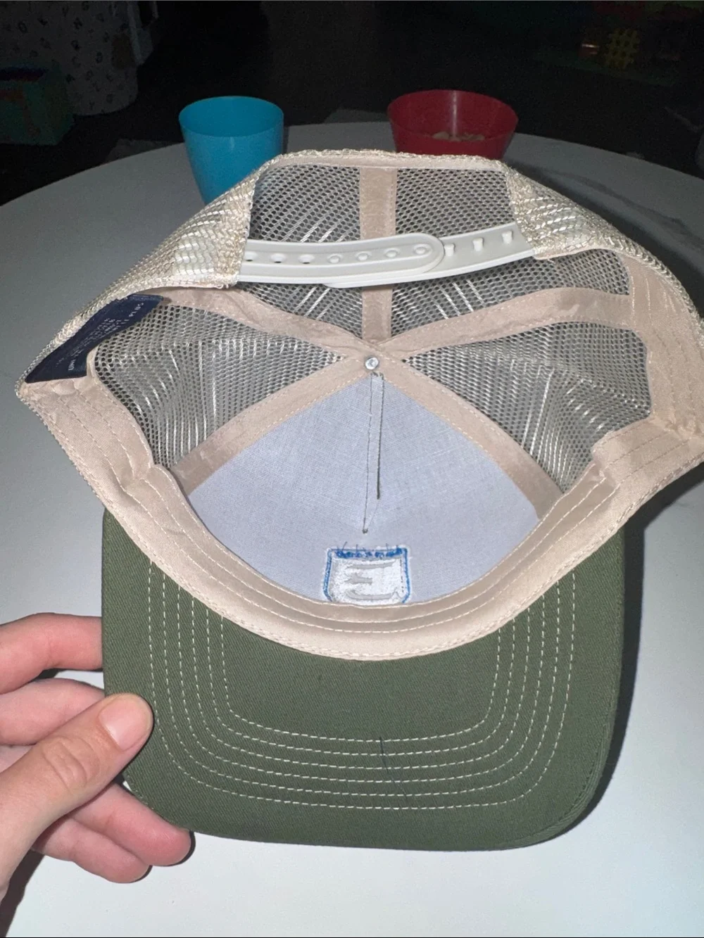 Olive green/khaki trucker hat with Bentley logo